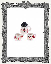 Miniature Ceramic Snowman and Santa Tea Set